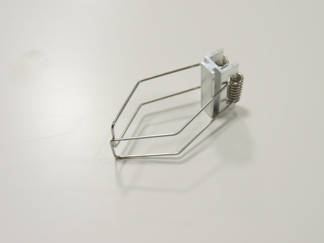 Úchyty, spojky, závěsný materiál - Montážní pružina pro profil IN50 - foto 1